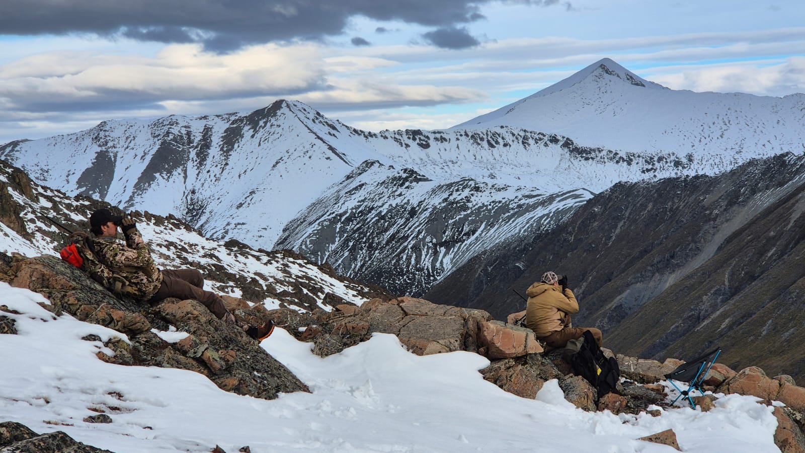 Two hunters glassing for tahr from a snowy ridge, New Zealand tops — Nokka Tactical on the Australian Hunting and Beyond Podcast