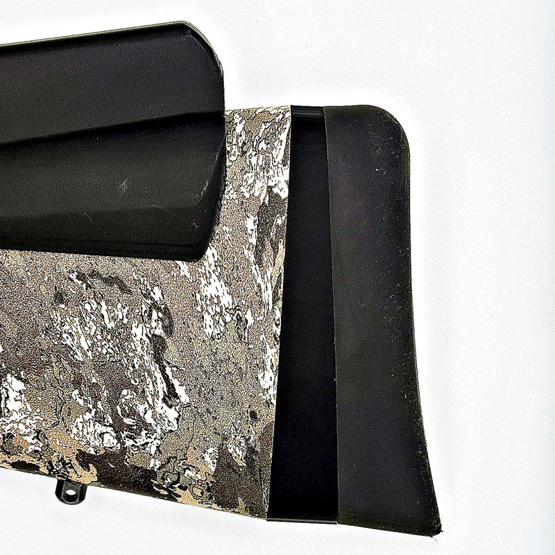 Nokka Flat-Recoil LOP spacer installed on a Tikka T3x — the raked wedge sits between the stock and the recoil pad, thin at the toe and thick at the heel